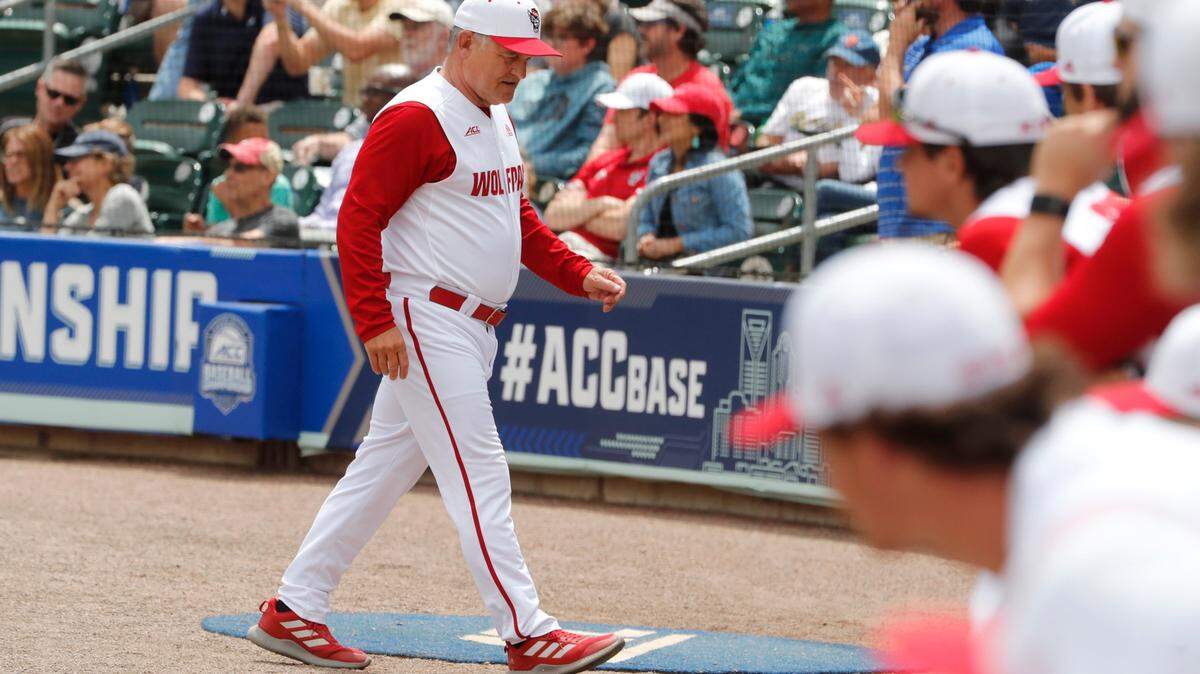 N.C. State head coach Elliott Avent walks back to the dugout after during Duke’s 1-0 victory over N.C. State to win the ACC Baseball Championship game at Truist Field in Charlotte, N.C., Sunday, May 30, 2021.
