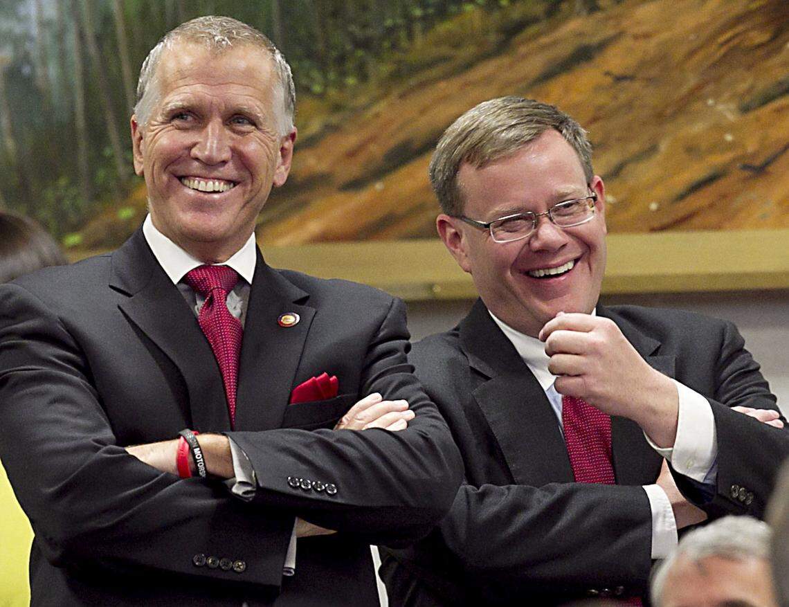 Rep. Tim Moore of Kings Mountain, N.C., the House Rules Chairman chats with Speaker of the House Thom Tillis during debate of Senate Bill 402 in July 2013 at the North Carolina General Assembly.