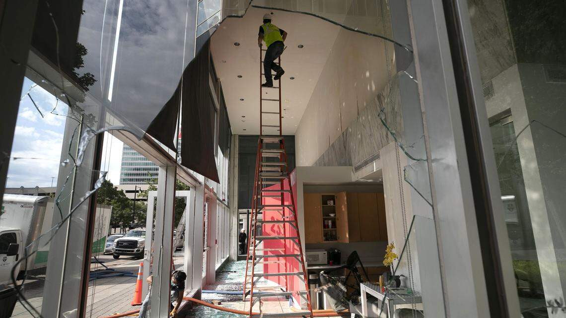 Construction crews work to clean up the offices of the Indy Week at 225 Fayetteville Street #105 on Sunday, May 31, 2020 in Raleigh, N.C. The office, like much of downtown suffered extensive damage from violent demonstrations in reaction to the death of George Floyd in Minneapolis, MN.