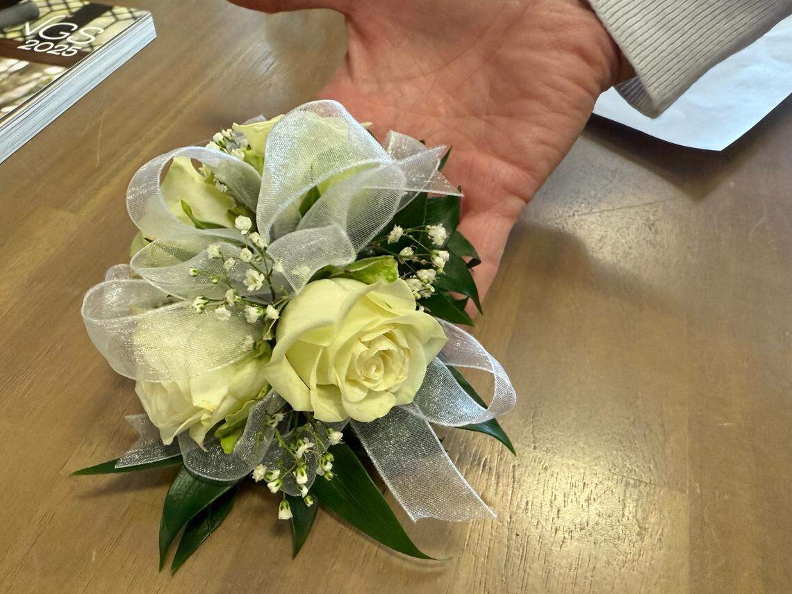 A wrist corsage from North Raleigh Florist.