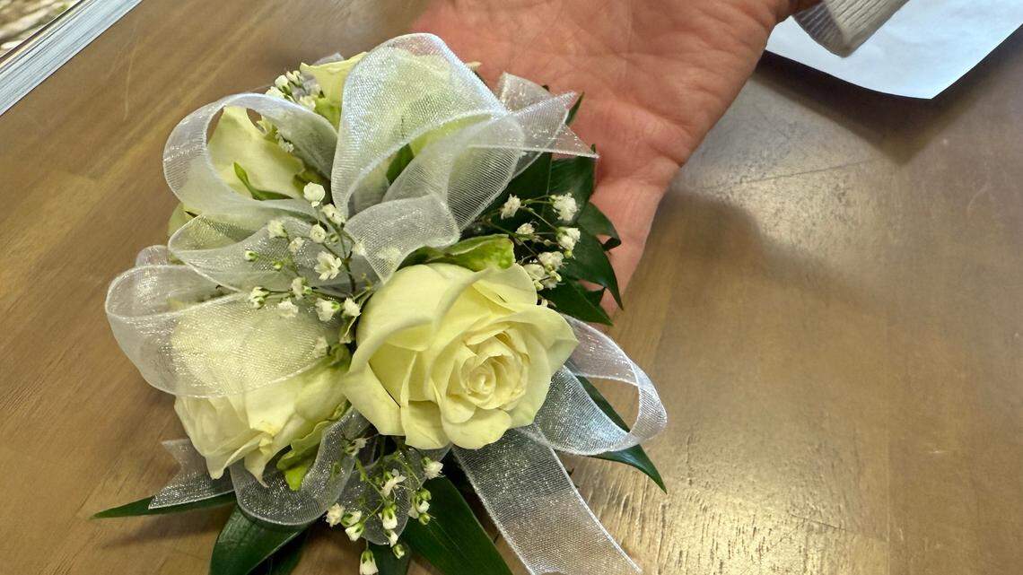A wrist corsage from North Raleigh Florist.