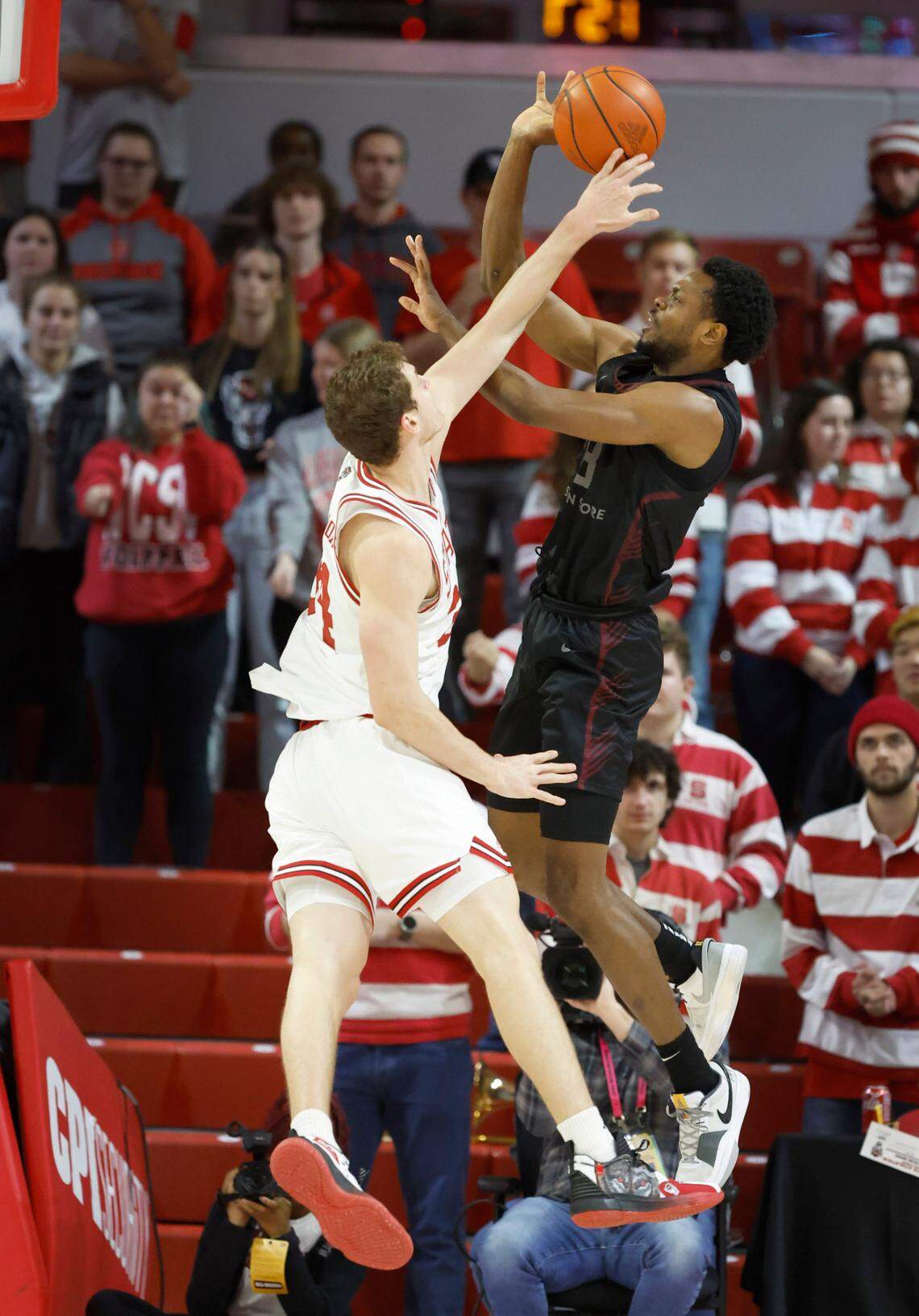 N.C. State’s Ben Middlebrooks (34) blocks the shot by Maryland Eastern Shore’s Victory Naboya (13) during the second half of N.C. State’s 93-61 victory over Maryland Eastern Shore at Reynolds Coliseum in Raleigh, N.C., Wednesday, Dec. 6, 2023.