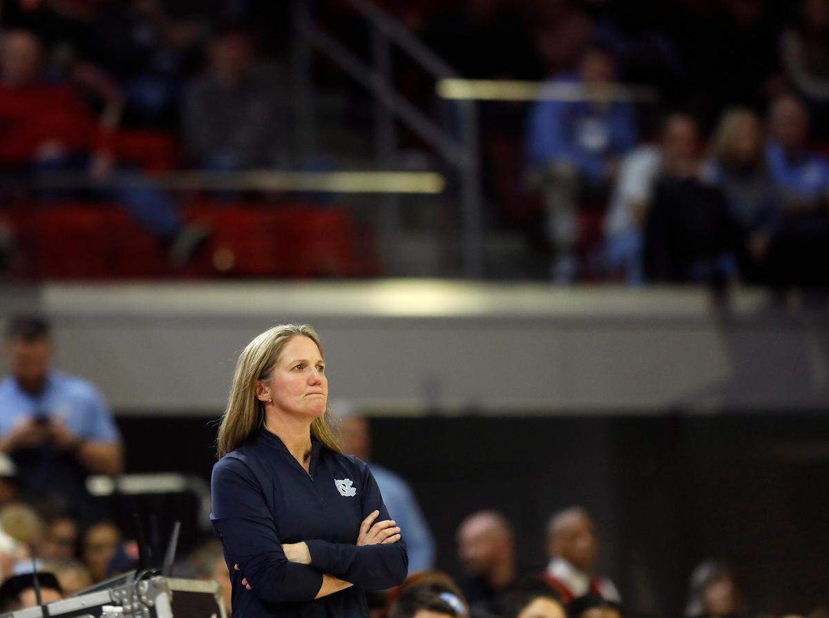 North Carolina head coach Courtney Banghart watches during the second half of the Tar Heels’ 63-59 loss to N.C. State on Thursday, Feb. 1, 2024, at Reynolds Coliseum in Raleigh, N.C.