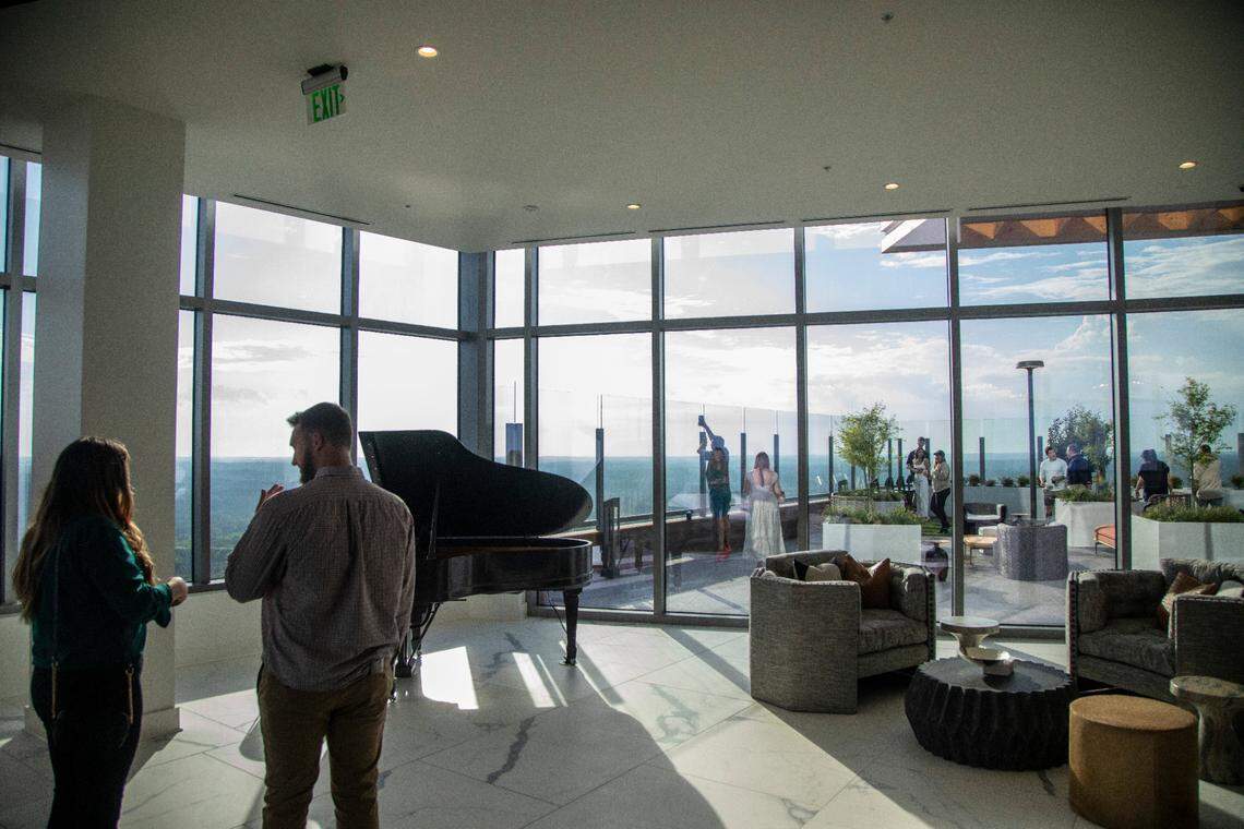 Potential renters tour Kane Realty’s 36-story luxury apartment tower off Six Forks Road called the Eastern Residences at North Hills in Raleigh Friday, May 6, 2022.