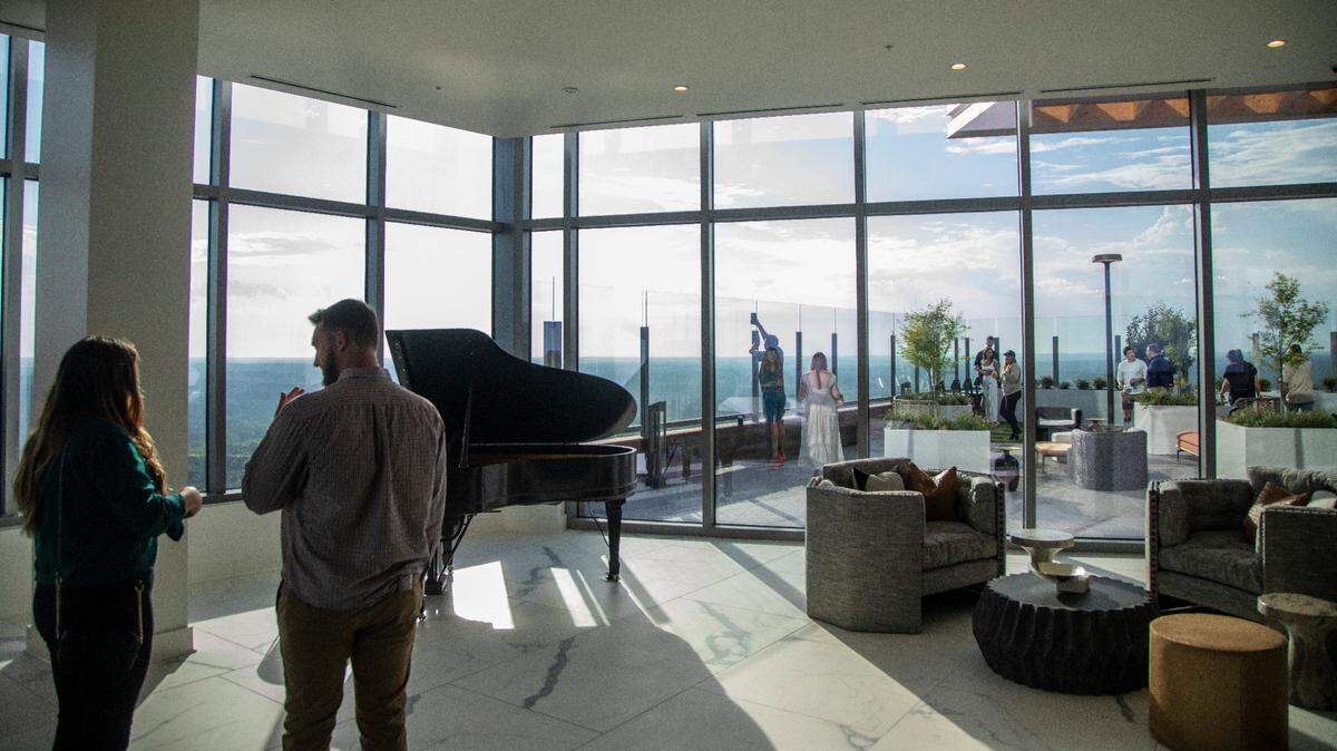Potential renters tour Kane Realty’s 36-story luxury apartment tower off Six Forks Road called the Eastern Residences at North Hills in Raleigh Friday, May 6, 2022.