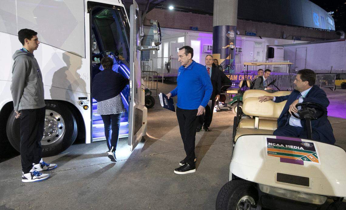 Duke head coach Mike Krzyzewski boards the bus after UNC’s 81-77 victory over Duke in the Final Four at Caesars Superdome in New Orleans, La., Saturday, April 2, 2022.