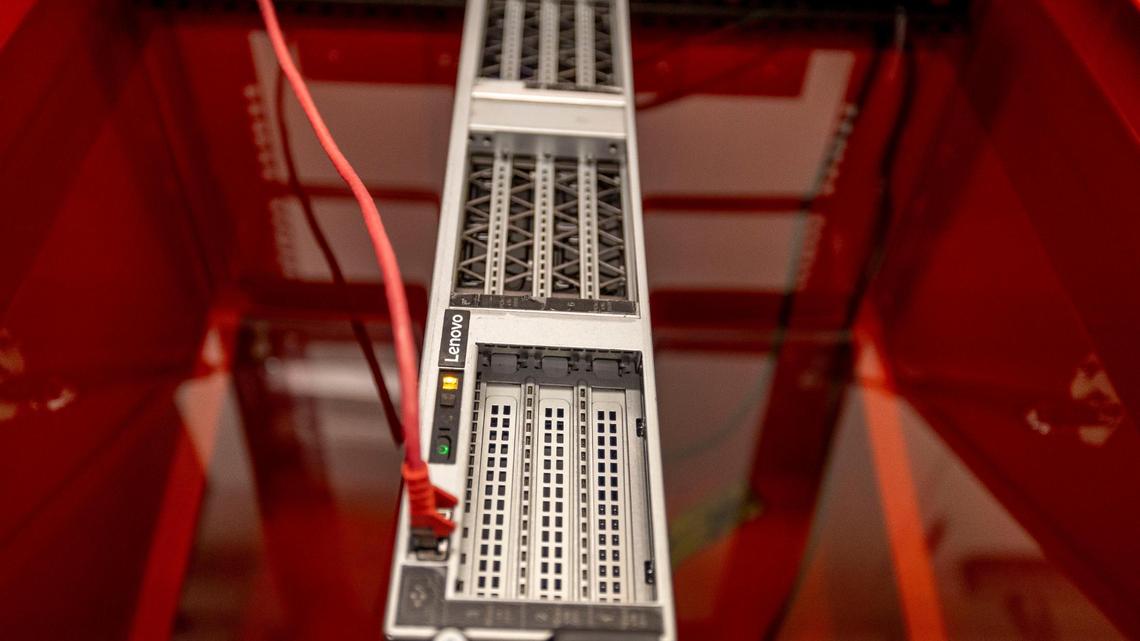 In this immersion bath, Lenovo engineers dip electronics into fluids to transfer heat way from computer servers on Tuesday, January 28, 2025 in Morrisville, N.C.