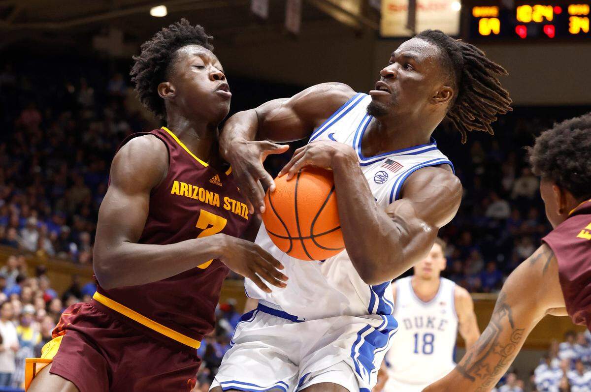 Duke’s Sion James (14) drives past Arizona State’s Joson Sanon (3) during the second half of Duke’s 103-47 victory over Arizona State in the Brotherhood Run Charity Game at Cameron Indoor Stadium in Durham, N.C., Sunday, Oct. 27, 2024.