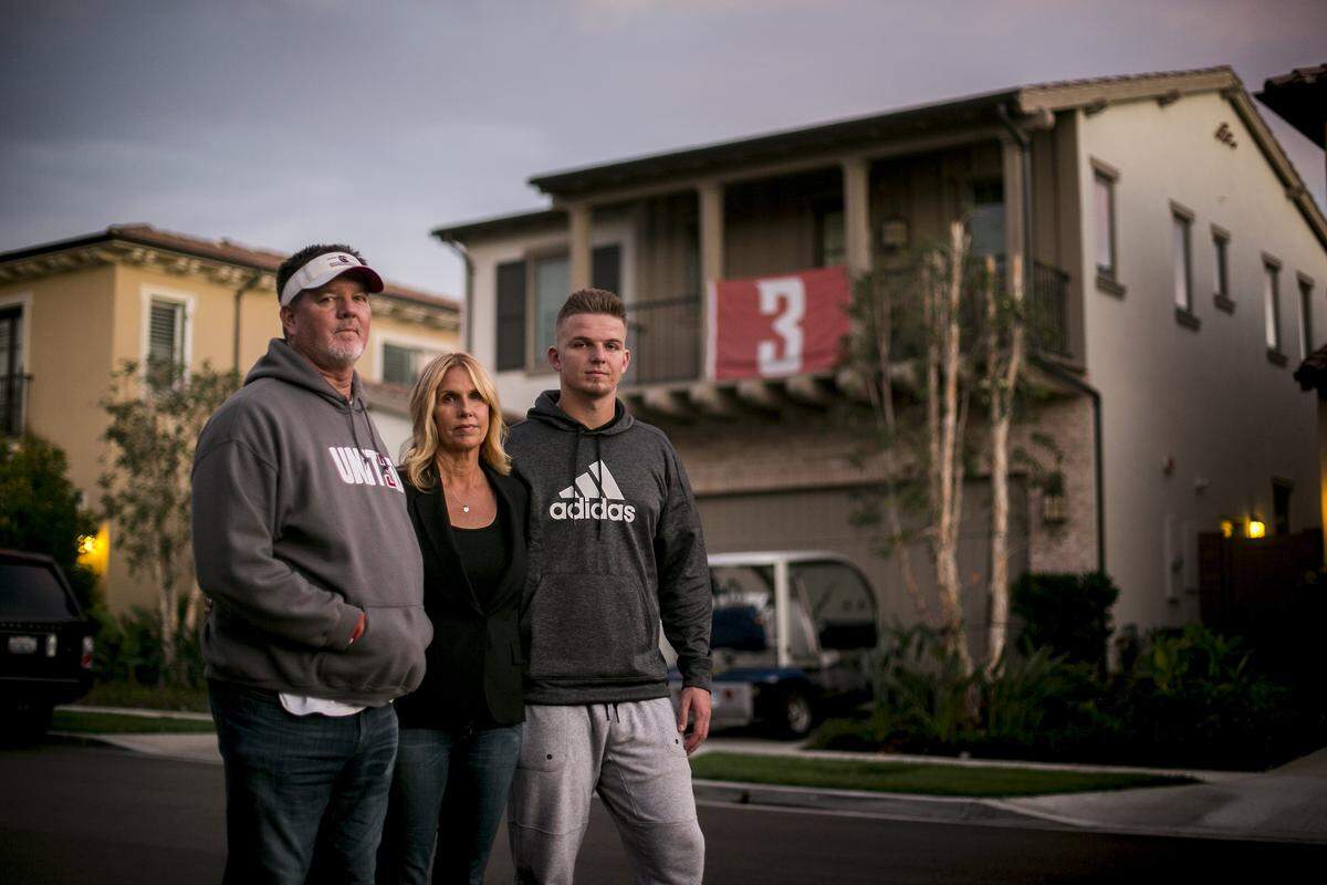 Ryan Hilinski with parents Mark and Kym Hilinski at home in Irvine, Calif., Oct. 25, 2018. His brother Tyler, a quarterback at Washington State, was posthumously diagnosed with CTE after his sudden suicide. Now Ryan is a star recruit himself. ItÕs raw and complicated, and he can only compartmentalize so much.