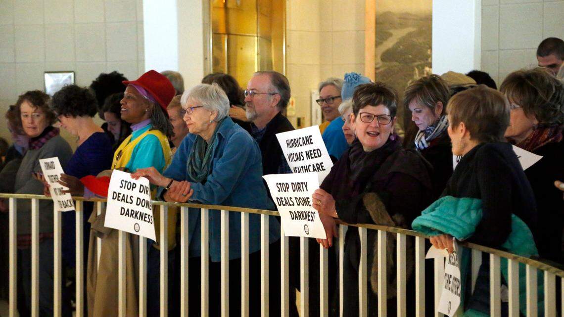 Protesters crowd the rotunda in the Legislative Building as the N.C. General Assembly reconvenes for a special session to take up the issues related to Hurricane Matthew and the wildfires in the mountains that affected the state in the last few months on Dec. 13, 2016.