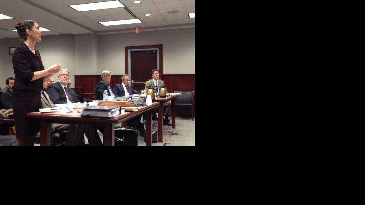 Attorneys for a group opposing the voter ID law, left, and attorneys defending the law, right, participate in a hearing questioning whether voter ID requires a change in the state Constitution.