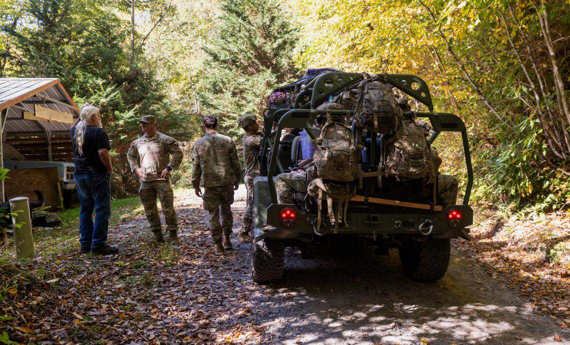 Soldiers with the 101st Airborne Division Air Assault, 2nd Brigade Combat Team, from Fort Campbell, Kentucky, use Infantry Squad Vehicles to deliver water, food, toiletries, and other aid to residents in the Soco Gap community in Maggie Valley on Tuesday, October. 8, 2024. The team has been using the Maggie Valley Pavilion and Town Hall as a distribution base for relief efforts in the town following Tropical Storm Helene.