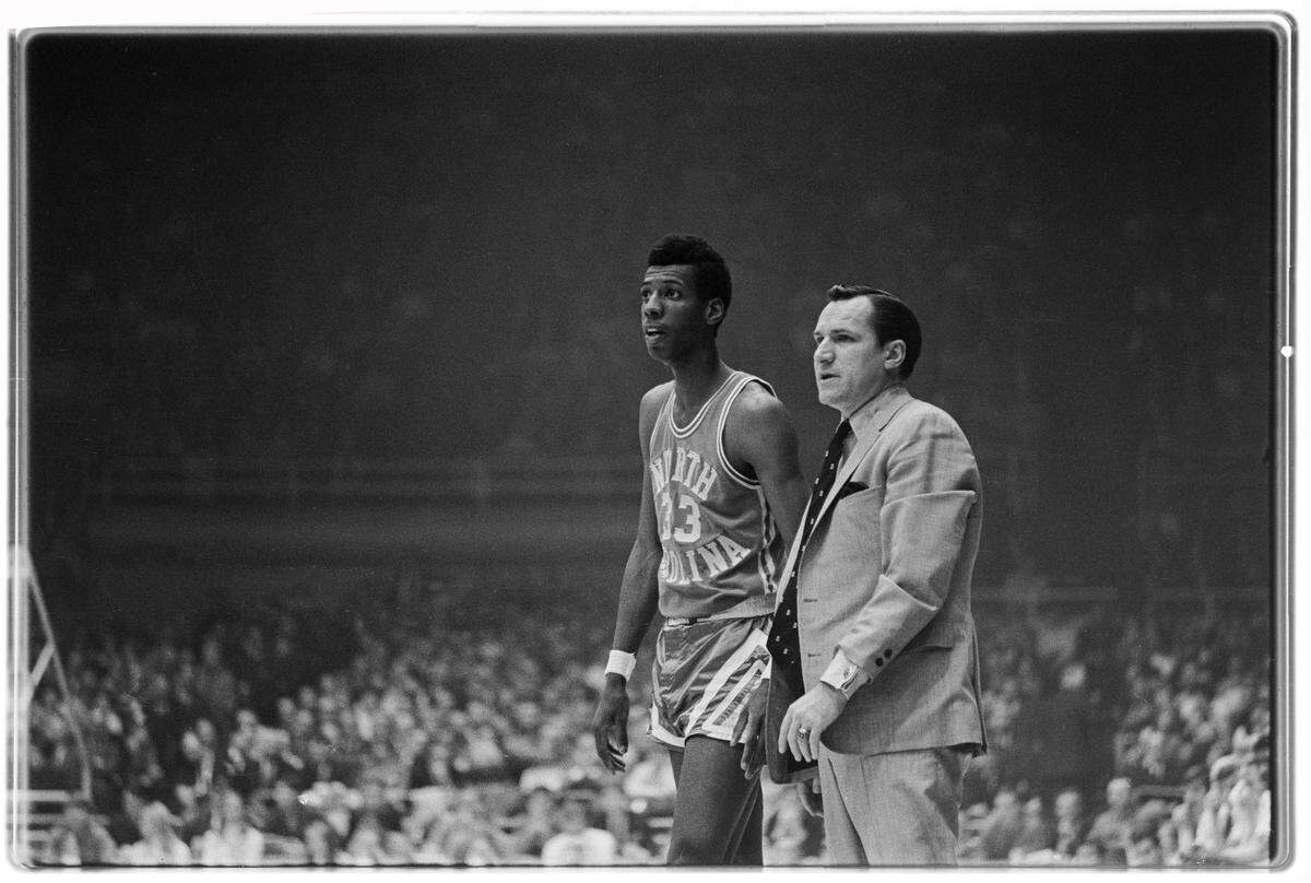 UNC coach Dean Smith with Charlie Scott during the 1969 ACC Tournament in Charlotte, NC.