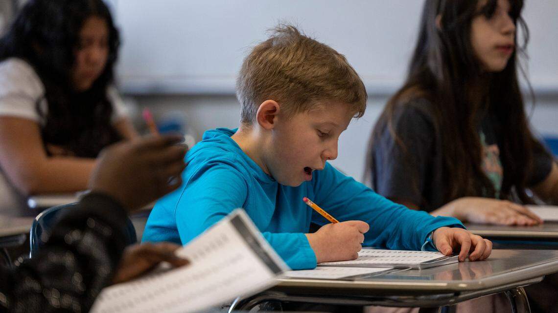 Carter Wall reads aloud in Kimberly Shaw’s sixth-grade reading class at Reddy Creek Magnet Center for Digital Sciences in Cary on Tuesday, March 4, 2025.