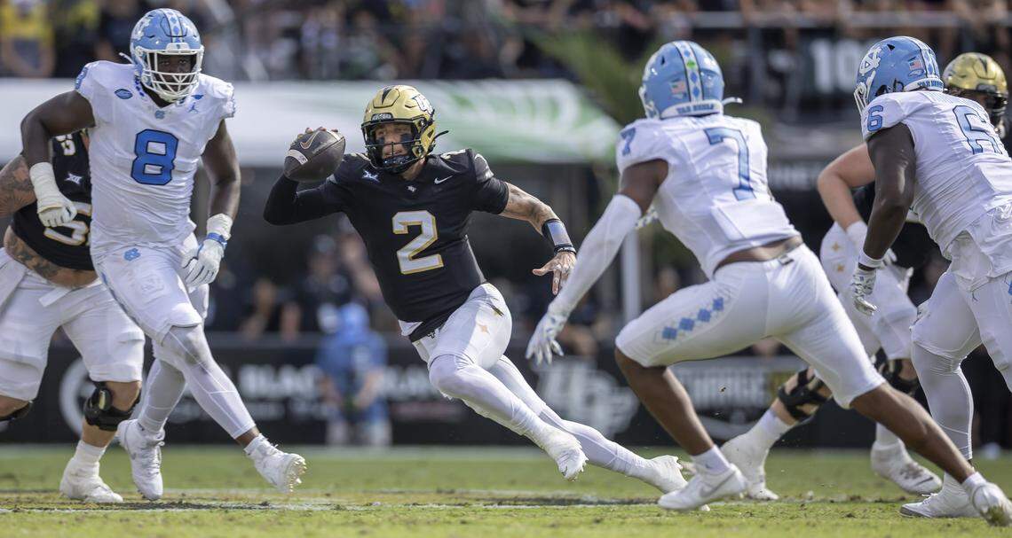 University of Central Florida quarterback Tayven Jackson (2) scrambles out of the pocket in the first quarter against North Carolina on Saturday, September 20, 2025 at Acrisure Bounce House Stadium in Orlando, Fla.
