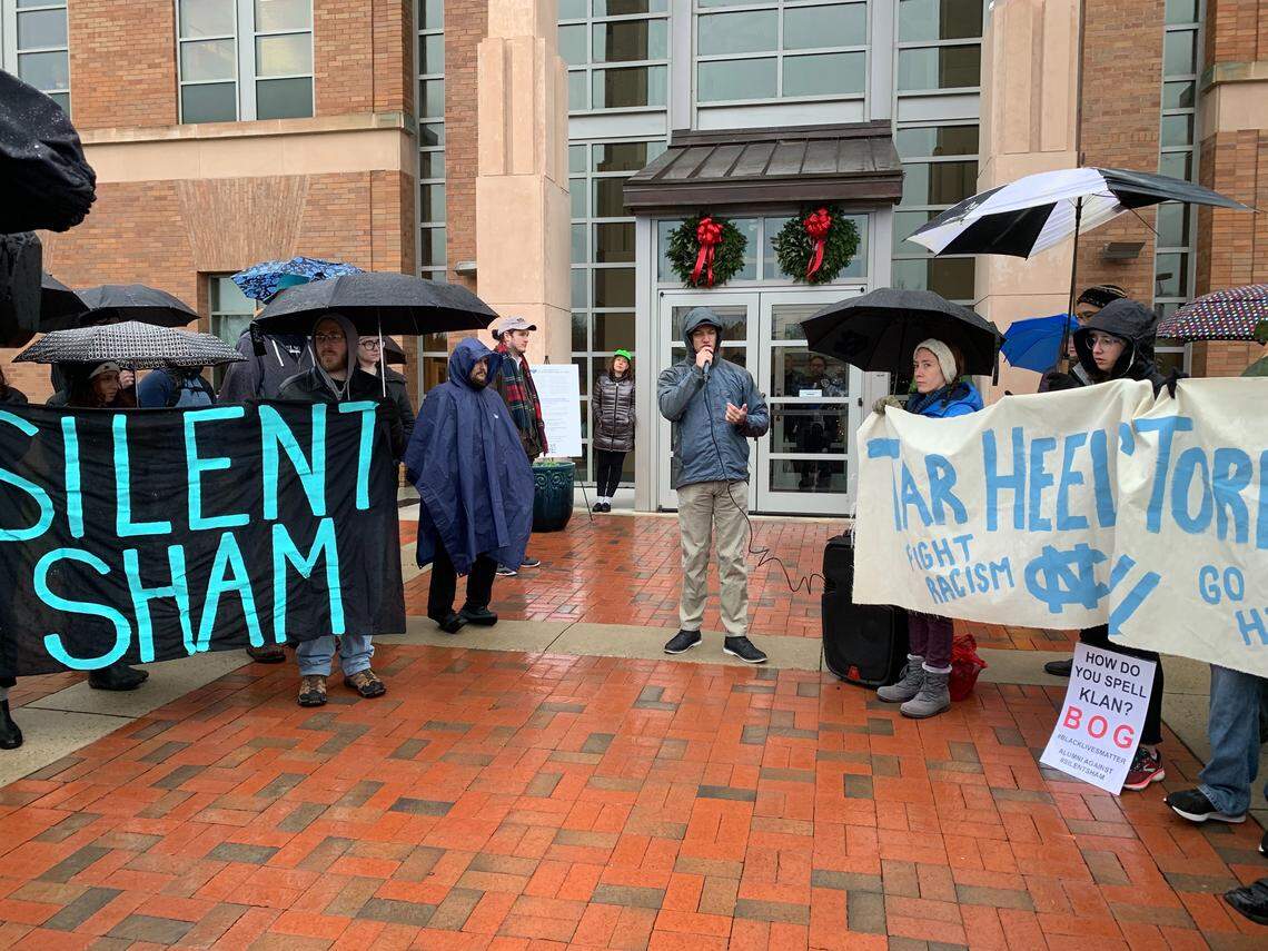 Protesters in 2019 gathered in Chapel Hill to condemn the UNC System’s $2.5 million settlement with the N.C. Sons of Confederate Veterans over the Silent Sam monument.
