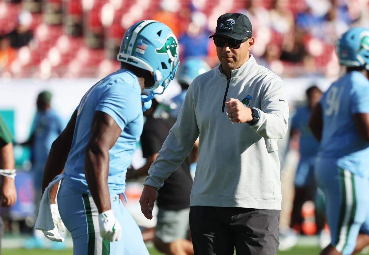 Tulane Green Wave head coach Jon Sumrall  against the Florida Gators prior to the game at Raymond James Stadium. 