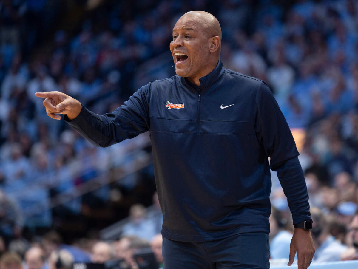 Syracuse head coach Adrian Autry directs the Orange in the first half against North Carolina on Saturday, January 13, 204 at the Smith Center in Chapel Hill, N.C.