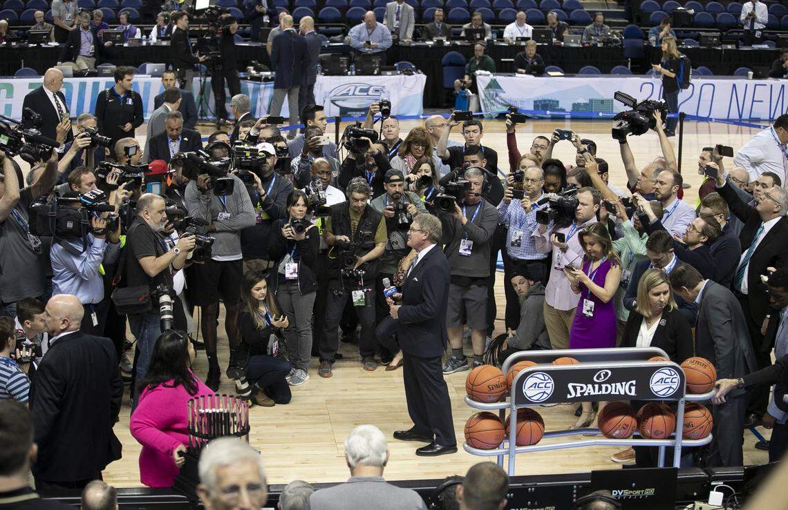 ACC Commissioner John Swafford waits for the players from Florida State and Clemson to join him on the court of the Greensboro Coliseum, before announcing the cancellation the ACC Men’s Basketball Tournament due to the COVID-19 virus on Thursday, March 12, 2020 at the Greensboro Coliseum in Greensboro, N.C.