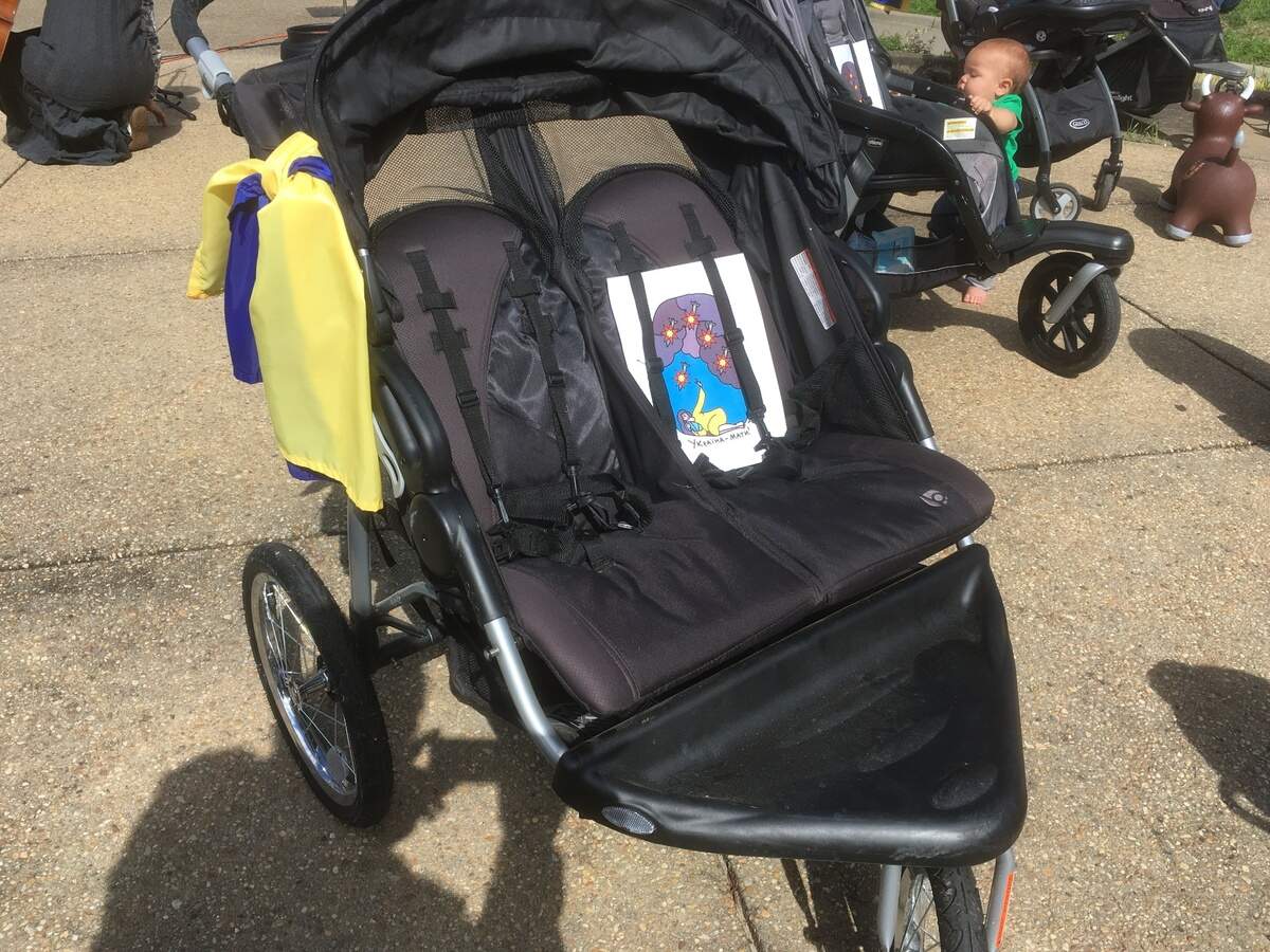 Strollers at a rally in support of Ukraine at the state Capitol on Sunday, March 20, 2022, symbolize the children who have been killed.