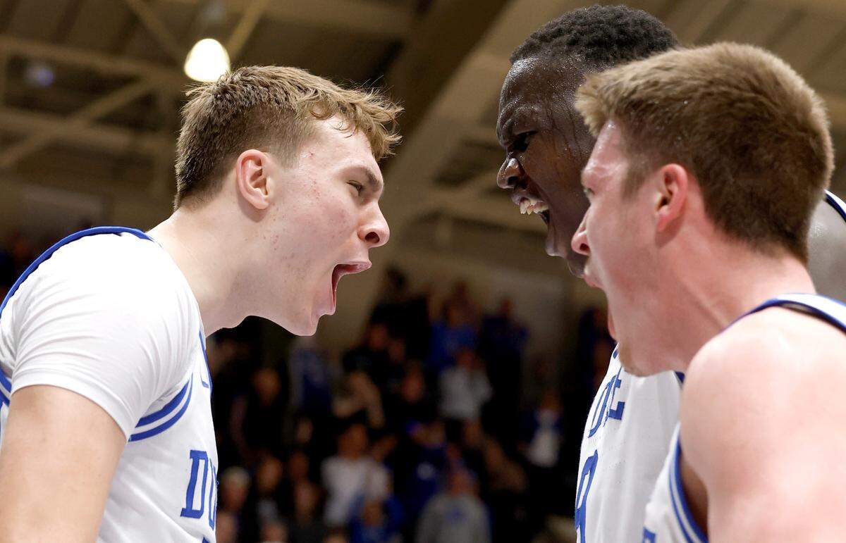 Duke’s Cooper Flagg (2) celebrates with Khaman Maluach (9) and Kon Knueppel (7) after slamming in two during the second half of Duke’s 76-47 victory over Pitt at Cameron Indoor Stadium in Durham, N.C., Tuesday, Jan. 7, 2025.