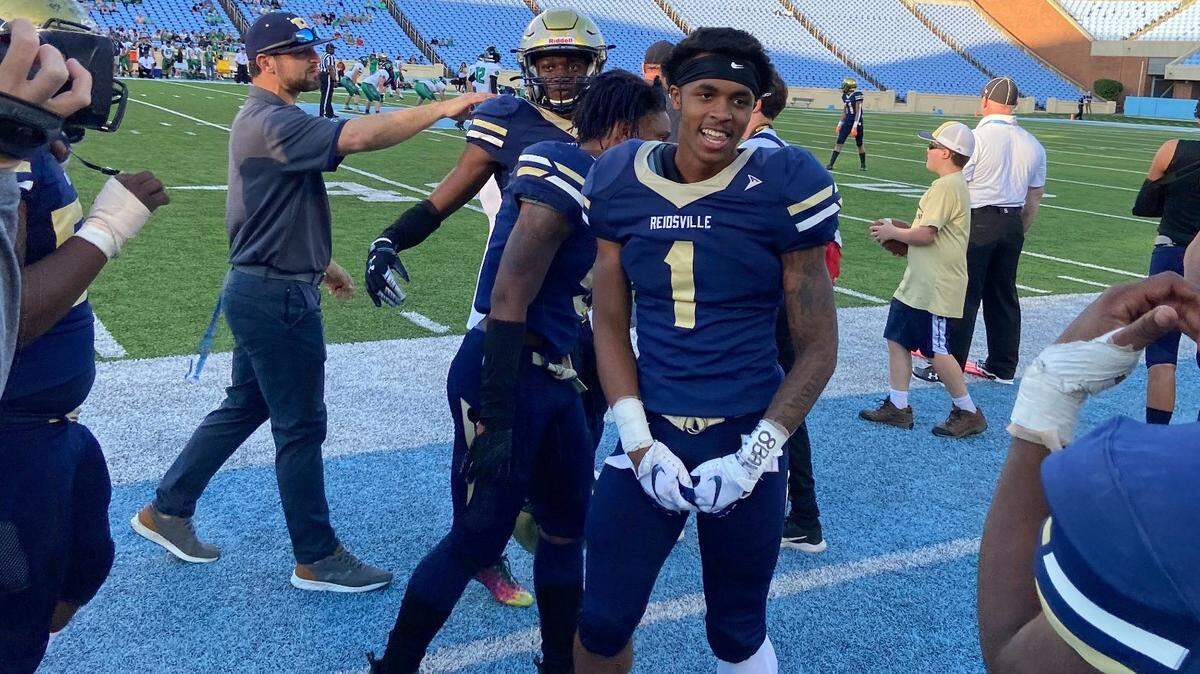Reidsville senior Breon Pass celebrates the Rams 35-6 win over Mountain Heritage in the 2021 NCHSAA 2A title game Saturday, May 8, 2021. Pass will play basketball at N.C. State next season.