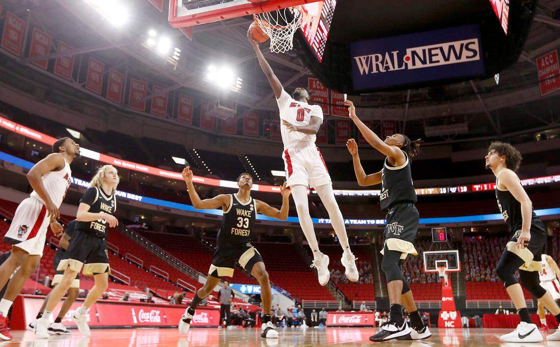 N.C. State’s D.J. Funderburk (0) drives to the basket during N.C. State’s 72-67 victory over Wake Forest at PNC Arena in Raleigh, N.C., Wednesday, January 27, 2021.