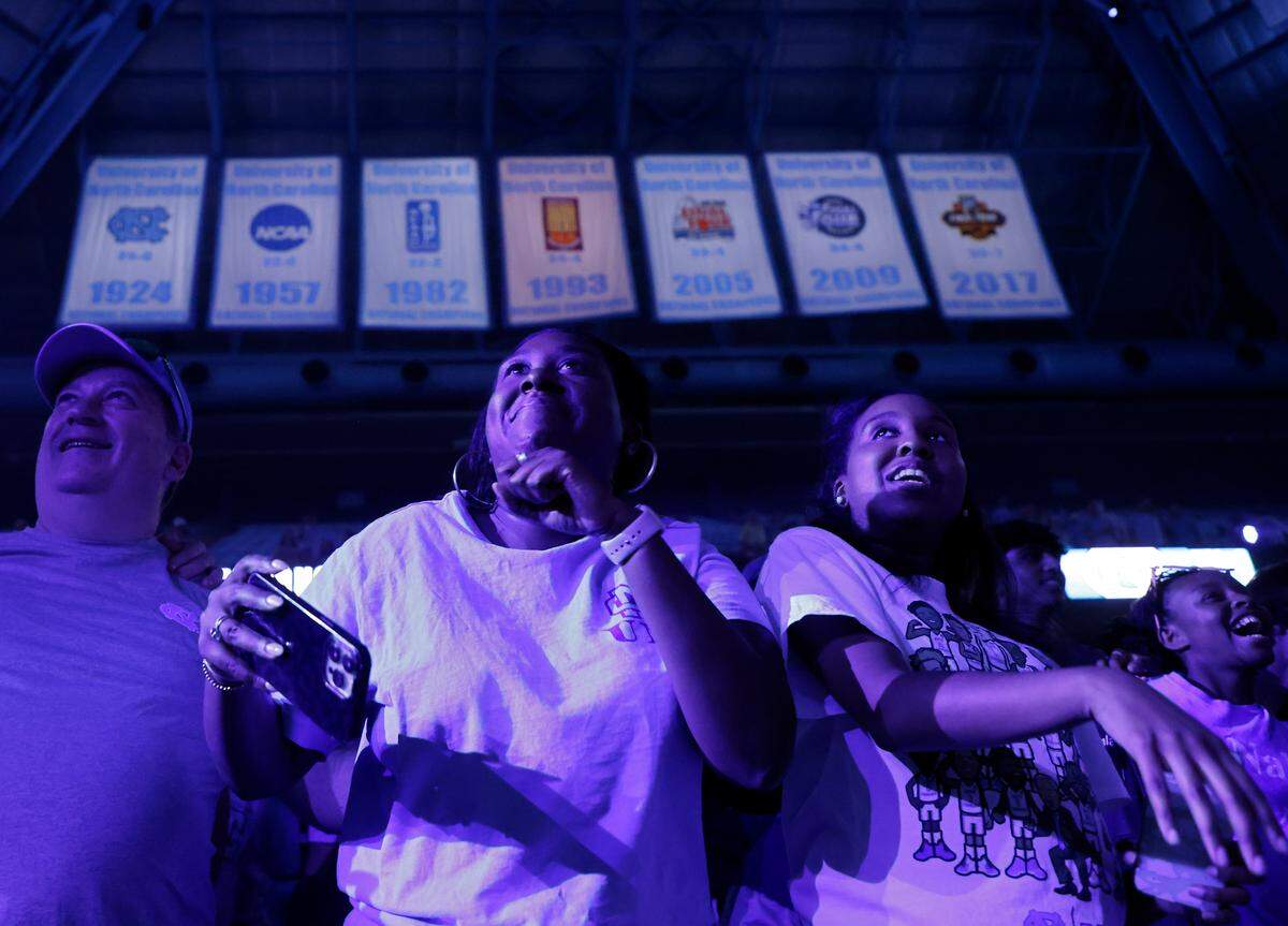 Fans react as the North Carolina men’s basketball team is introduced during “Live Action with Carolina Basketball” at the Dean E. Smith Center on Friday, Oct. 7, 2022, in Chapel Hill, N.C.