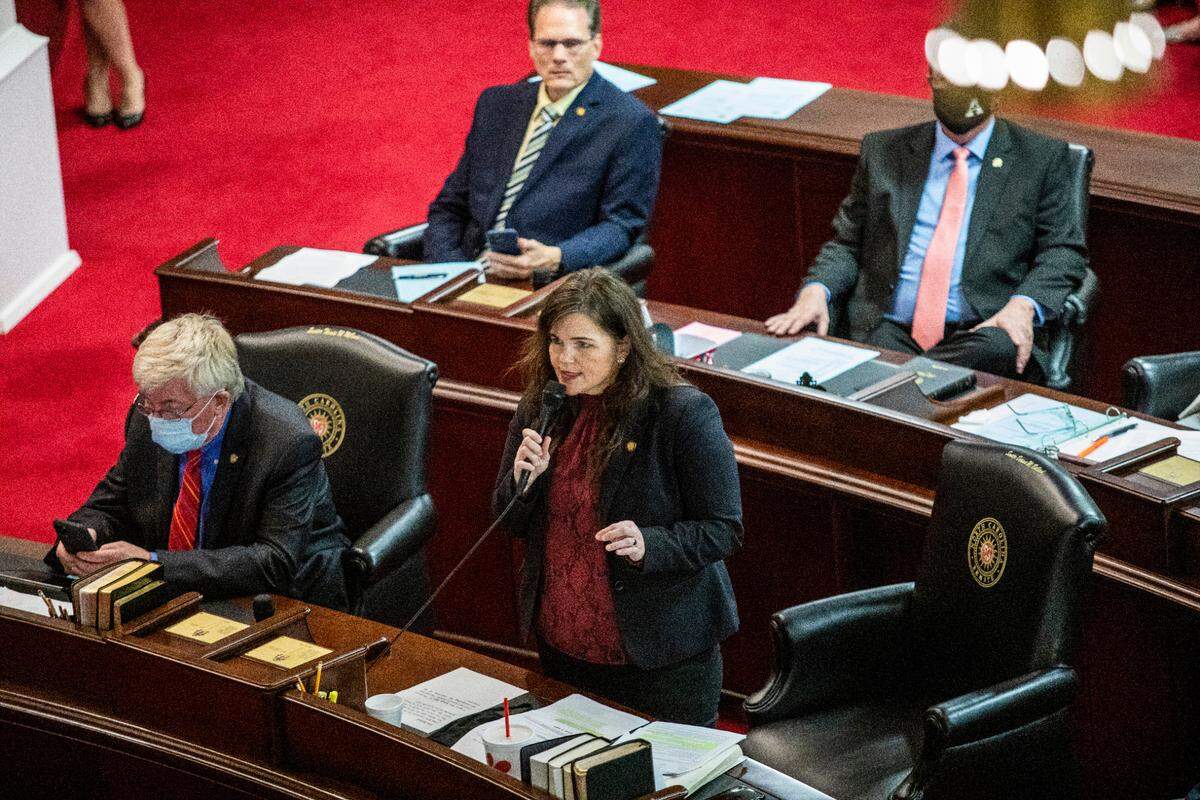 Watauga Republican Sen. Deanna Ballard, center, speaks on the Senate floor prior to a failed veto override vote on SB 37, the schools reopening bill Gov. Cooper vetoed, Monday, March 1, 2021 at North Carolina General Assembly. Some North Carolina schools have been remote-only for nearly a year.
