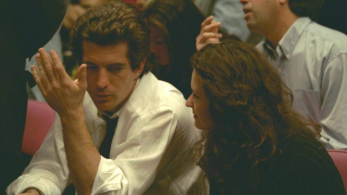 John F. Kennedy Jr. at a New York Knicks vs Chicago Bulls basketball game at Madison Square Garden in 1999, as seen in the documentary “JFK Jr: The Final Year,” airing on the 20-year anniversary of his death on A&E.