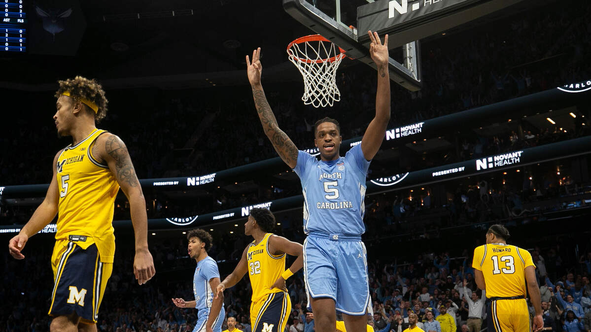 North Carolina’s Armando Bacot (5) reacts after Caleb Love’s basket and foul in the first half on Wednesday, December 21, 2022 at the Spectrum Center in Charlotte, N.C.