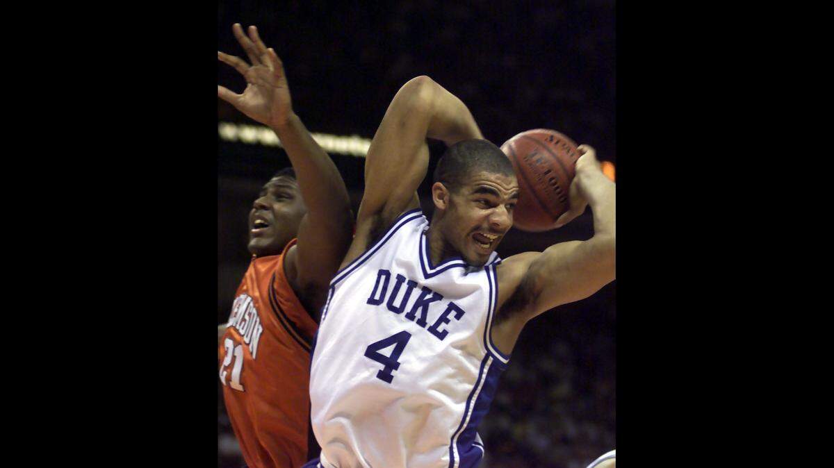 Former Duke standout Carlos Boozer, who played for the Blue Devils from 1999-2002, claims he turned down gifts from other schools to play for coach Mike Krzyzewski.