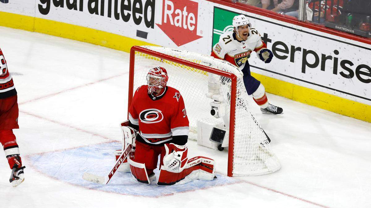 Florida center Nick Cousins (21) celebrates a goal by Matthew Tkachuk in the fourth overtime to give the Panthers a 3-2 victory over the Carolina Hurricanes in the first game of Eastern Conference Finals at PNC Arena in Raleigh, N.C., early Friday morning, May 19, 2023.