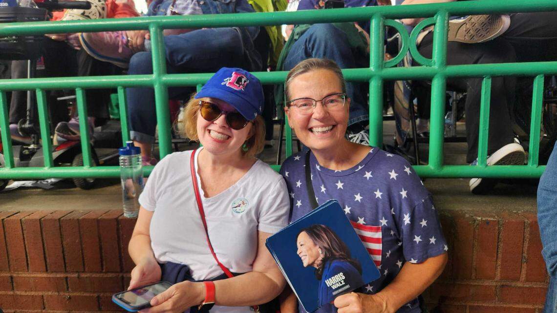 Natasha Richmond, left, and Janet Oesterling, right, who attended the Kamala Harris campaign rally at Coastal Credit Union Music Park at Walnut Creek in Raleigh on Wednesday, Oct. 30, 2024.