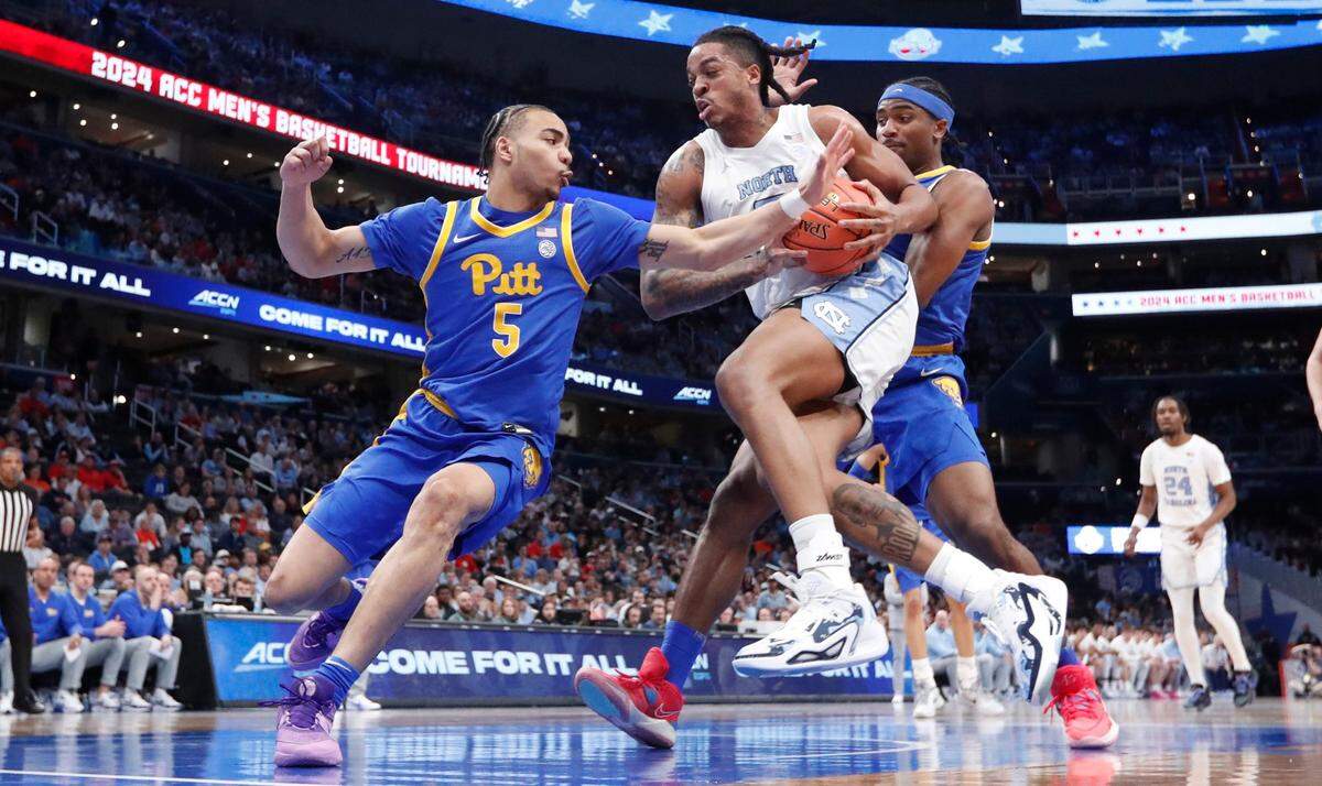 North Carolina’s Armando Bacot (5) drives by Pittsburgh’s Ishmael Leggett (5) during the first half of UNC’s game against Pitt in the semifinals of the 2024 ACC Men’s Basketball Tournament at Capital One Arena in Washington, D.C., Friday, March 15, 2024.