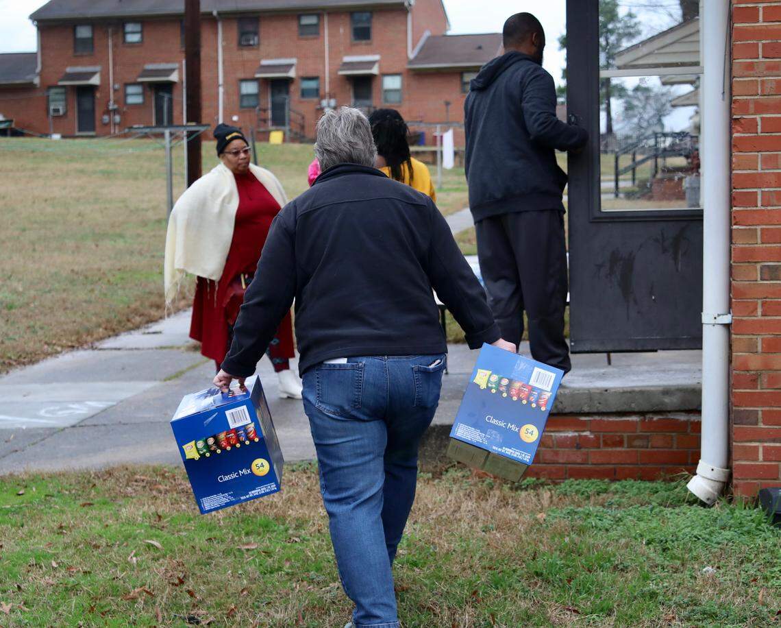 Donated snacks being brought to McDougald Terrace, to be given to tenants evacuated to nearby hotels. Emergency evacuations began at the public housing complex on Friday night, Jan. 3, amid carbon monoxide poisoning concerns.