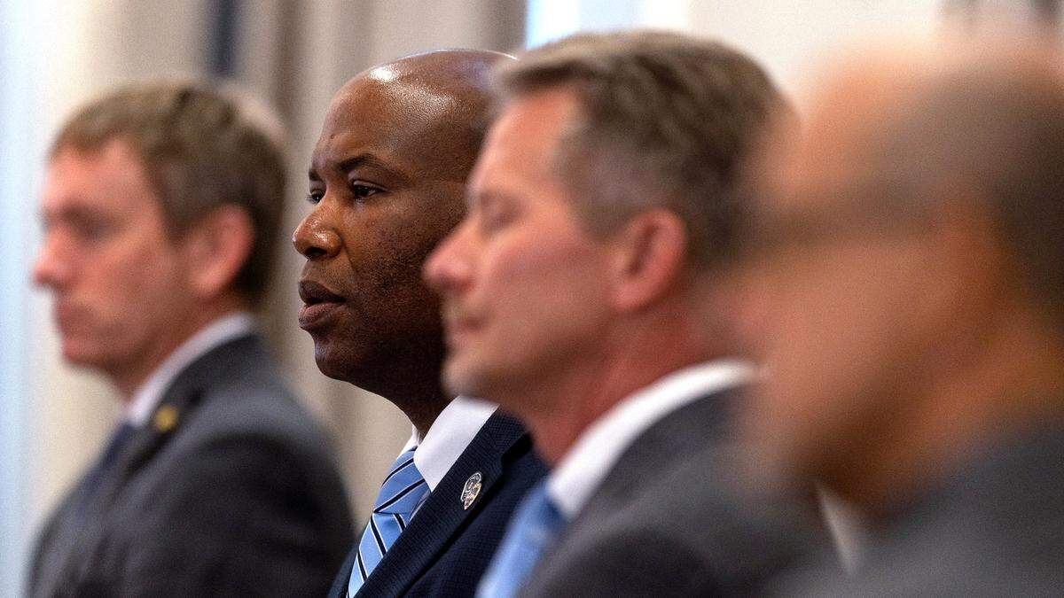 UNC Police Chief Brian James listens to a question about Monday’s campus shooting during a press conference held at the Carolina Inn on Tuesday, Aug. 29, 2023, in Chapel Hill, N.C.