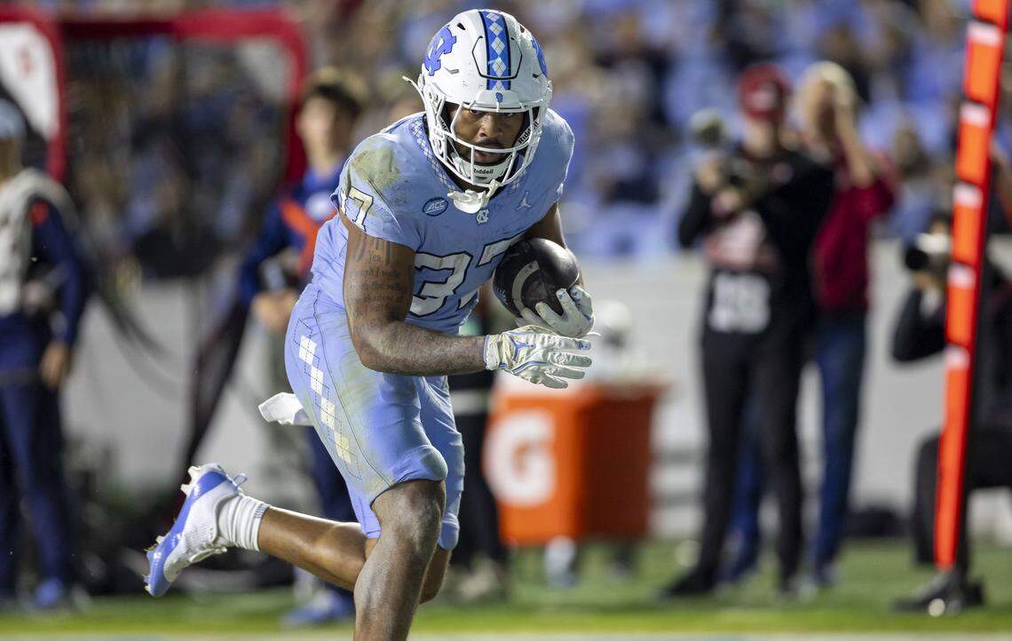 North Carolina running back Davion Gause (37) scores on a 20 yard pass reception from quarterback Gio Lopez (7) in the third quarter to take a 10-3 lead over Stanford on Saturday, November 8, 2025 at Kenan Stadium in Chapel Hill, N.C.