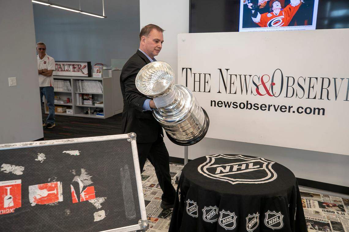 Howie Borrow, the ‘Keeper of the Cup’, unloads The Stanley Cup during a stop at The News & Observer on Wednesday, May 10, 2023 in Raleigh, N.C.