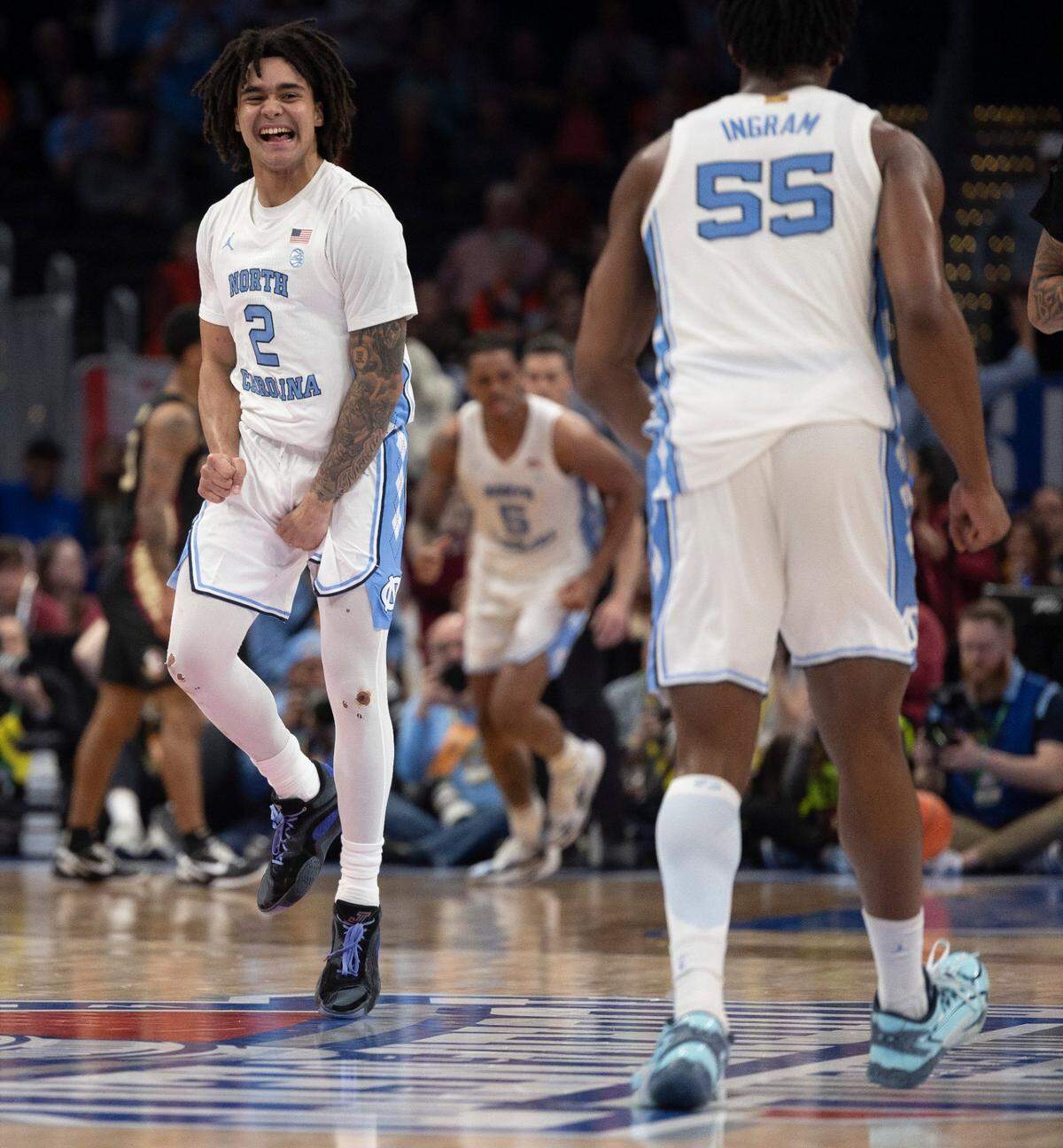 North Carolina’s Elliot Cadeau (2) reacts as the Tar Heels take a 46-27 lead over Florida State in the first half in the quarterfinals of the ACC Men’s Basketball Tournament at Capitol One Arena on Wednesday, March 13, 2024 in Washington, D.C.