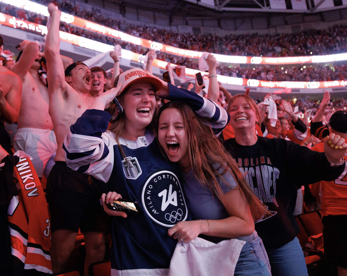 Fans celebrate the Carolina Hurricanes’ Stanley Cup victory over the Vegas Golden Knights during a game 6 watch party at the Lenovo Center on Sunday, June 14, 2026, in Raleigh, N.C.
