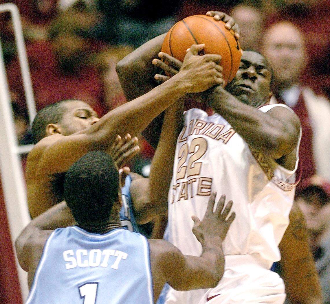North Carolina’s Rashad McCants and Melvin Scott put pressure on Florida State’s Tim Pickett during their game in January 2004.
