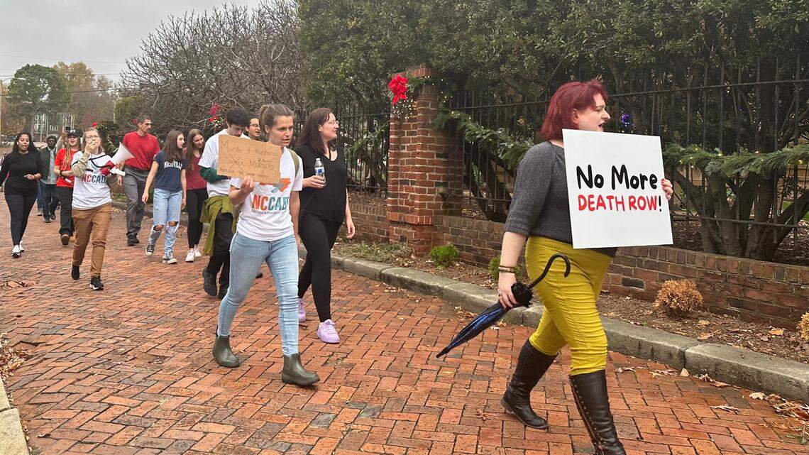 More than 200 people marched outside the North Carolina governor’s mansion on Saturday demanding he commute all the state’s death sentences to prison terms.