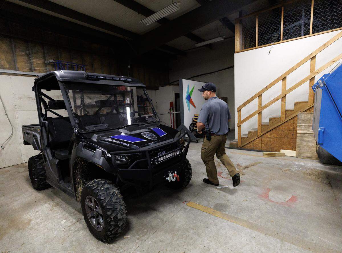 Knightdale Police Sgt. Rod Glahn prepares to take a utility task vehicle on a section of trail in Knightdale, N.C. on Wednesday, Aug. 13, 2025. 
