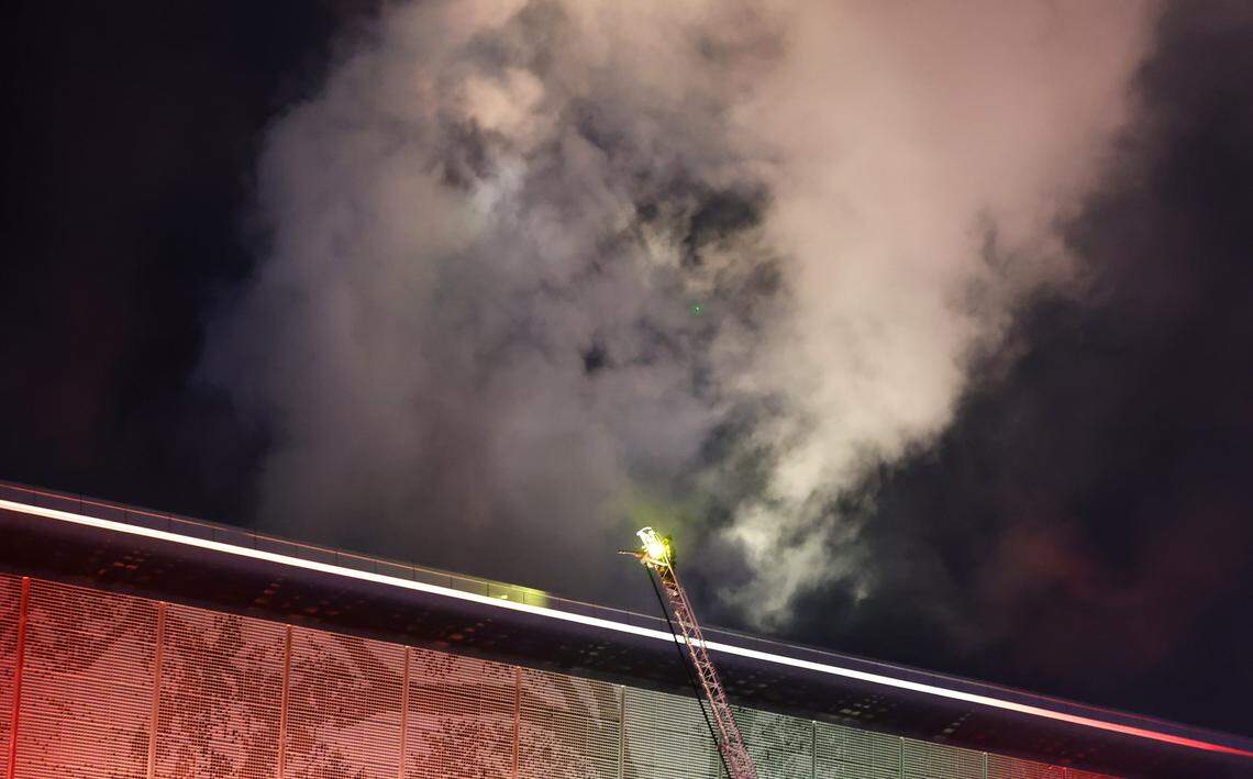 Firefighters battle a blaze at the Raleigh Convention Center in downtown Raleigh, N.C., Monday evening, Dec. 1, 2025.