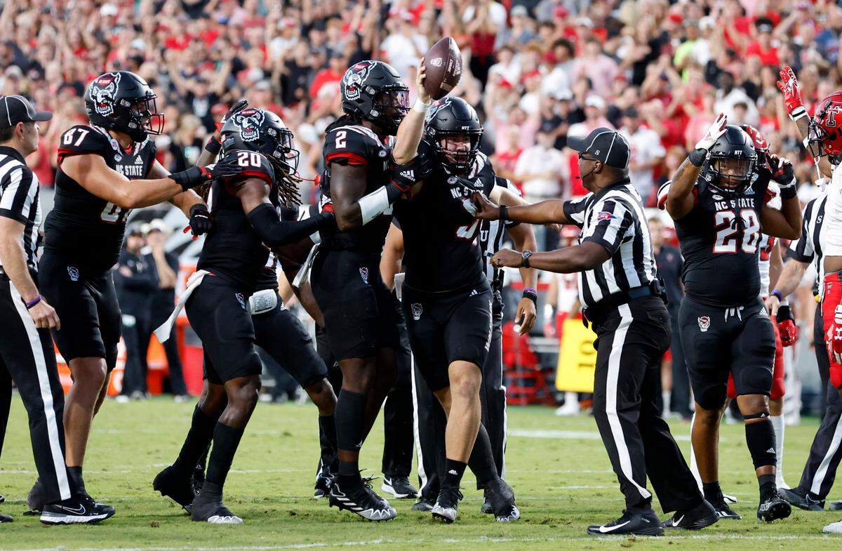 N.C. State long snapper Joe Shimko (91) celebrates after recovering a fumble by Texas Tech on a punt during the first half of N.C. State’s game against Texas Tech at Carter-Finley Stadium in Raleigh, N.C., Saturday, Sept. 17, 2022.