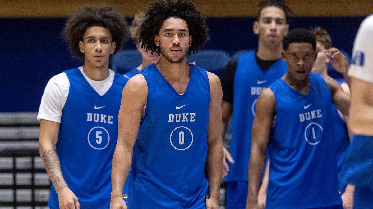Duke’s Tyrese Proctor, Jared McCain and Caleb Foster listen to instructions during a practice on Friday, Sept. 29, 2023, at Cameron Indoor Stadium in Durham, N.C.