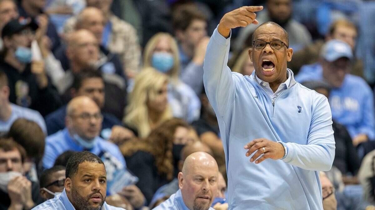 North Carolina coach Hubert Davis directs his team on defense during the first half against Michigan on Wednesday, December 1, 2021 at the Smith Center in Chapel Hill, N.C.