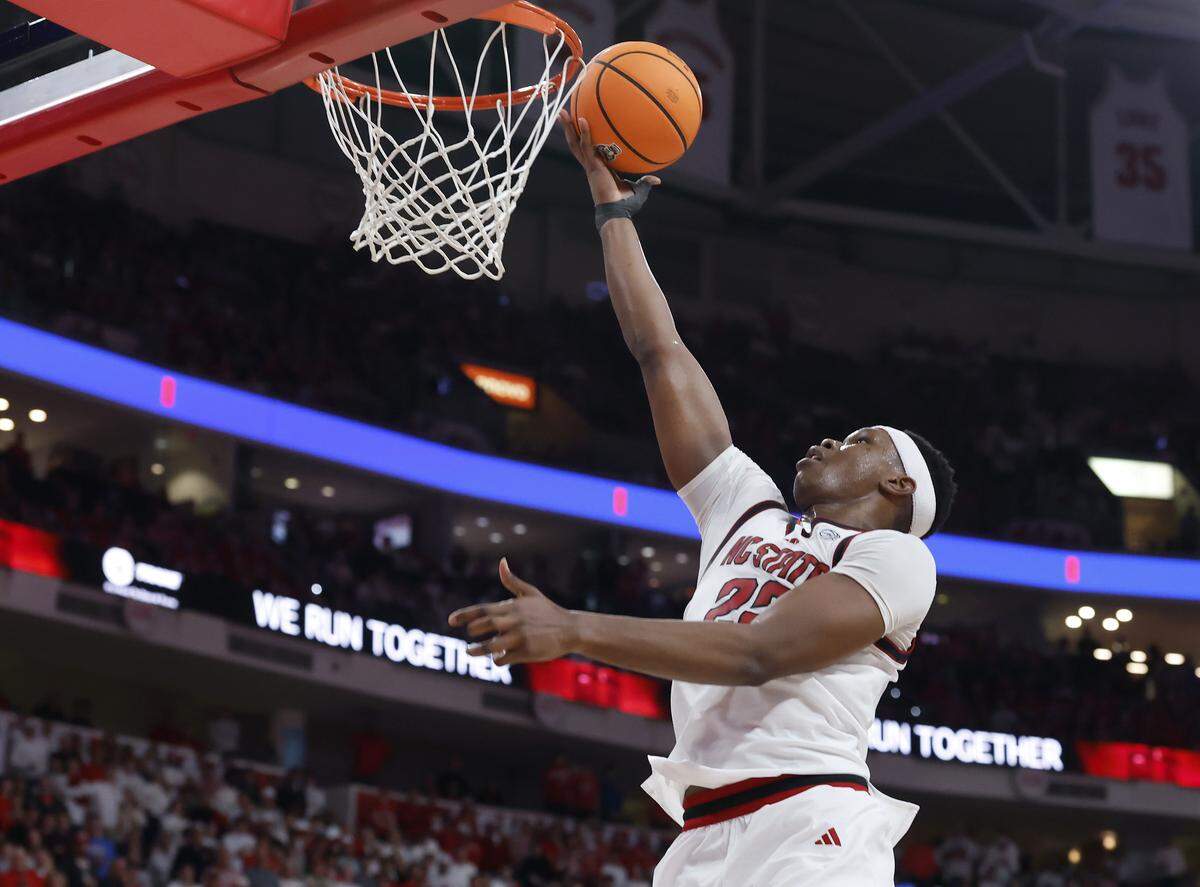 N.C. State’s Ven-Allen Lubin lays the ball in the hoop during the second half of the Wolfpack’s 77-76 overtime loss to Kansas on Saturday, Dec. 13, 2025, at Lenovo Center in Raleigh, N.C.