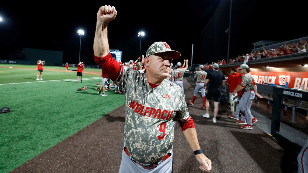N.C. State head coach Elliott Avent acknowledges the crowd after N.C. State’s 5-3 victory over James Madison in the NCAA Raleigh Regional final at Doak Field Sunday, June 2, 2024.
